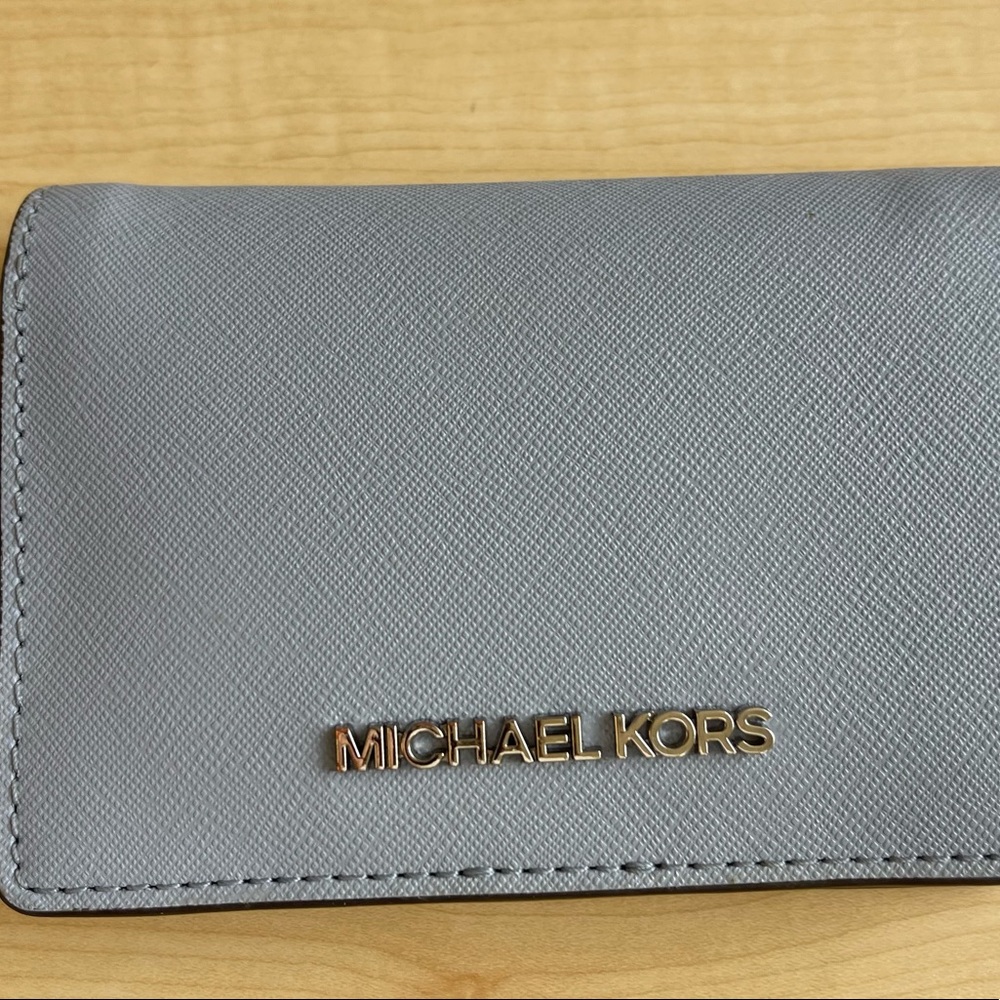 MICHAEL Michael Korda Pale Blue Leather Jet Slim Bifold Wallet